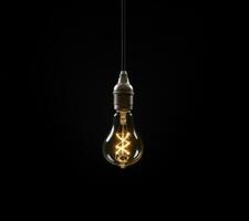 AI generated a light bulb is illuminated on a dark background photo