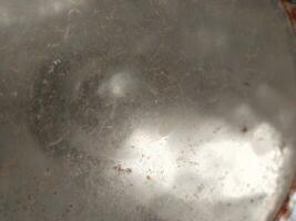 Abstract background of metal plate with some spots and spots on it photo