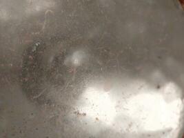 Abstract background of metal plate with some spots and spots on it photo