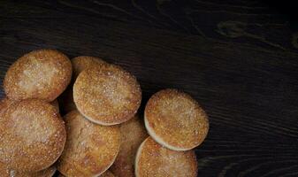 Beautiful round cookies on a wooden board. A few cookies. A bunch of cookies. photo