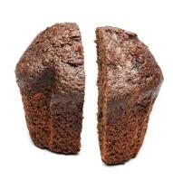 Chocolate muffin cut in half isolated on a white background. Chocolate chip muffin. photo