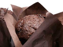 Chocolate muffin close-up .Muffin with chocolate chips. photo