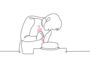 male pastry chef decorating cake with pink cream or icing - one line drawing vector. the concept confectioner vector