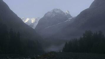 Picturesque view of a gorge between mountains. Creative. Beauty of nature and mountains with forest. photo