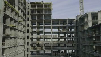 Apartments construction site with crane. Crane and building construction photo