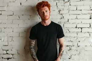 AI generated Handsome redheaded man in blank black t-shirt standing on brick wall background. photo