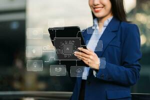 Woman using chatbot in computer and tablet  smart intelligence Ai.Chat with AI Artificial Intelligence, developed by OpenAI generate. photo