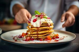 AI generated Chef Garnishing Stack of Pancakes with Berries photo
