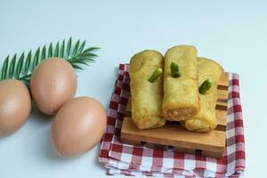 Risoles sosis mayo American risoles or mayonnaise sausage rissole is a small patty rolled in breadcrumbs. photo