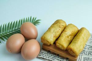 Risoles sosis mayo American risoles or mayonnaise sausage rissole is a small patty rolled in breadcrumbs. photo