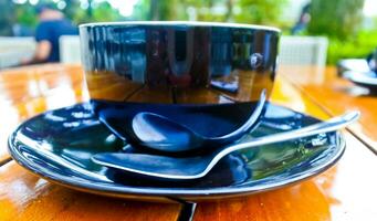 close up view of a cup of cappuccino coffee photo