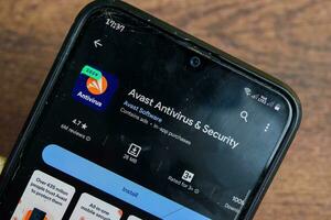 Avast Antivirus and Security application on Smartphone screen. Avast is a freeware web browser developed by Avast Software. Bekasi, Indonesia, Januay 2, 2023 photo