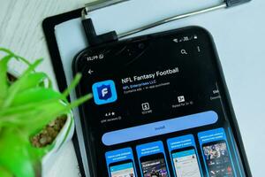 NFL Fantasy Football application on Smartphone screen. NFL is a freeware web browser developed by NFL Enterprise LLC. Bekasi, Indonesia, Januay 4, 2023 photo