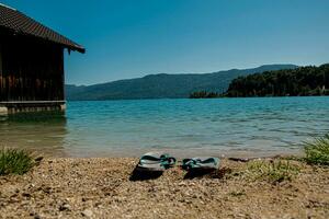 Slippers at the beach Kochelsee photo