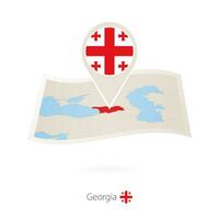 Folded paper map of Georgia with flag pin of Georgia. vector