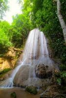 A gorgeous waterfall captured in long exposure, Thailand. photo