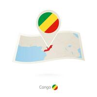 Folded paper map of Congo with flag pin of Congo. vector