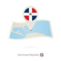 doblada papel mapa de dominicano república con bandera alfiler de dominicano república. vector