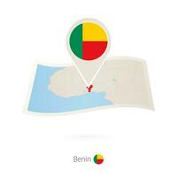 Folded paper map of Benin with flag pin of Benin. vector