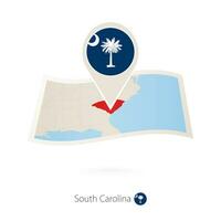 Folded paper map of South Carolina U.S. State with flag pin of South Carolina. vector