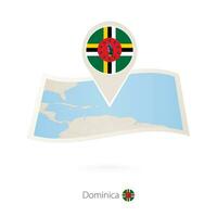 doblada papel mapa de dominica con bandera alfiler de dominicana vector