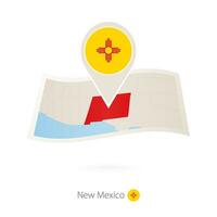 Folded paper map of New Mexico U.S. State with flag pin of New Mexico. vector