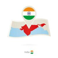 Folded paper map of India with flag pin of India. vector