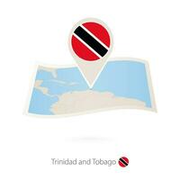 Folded paper map of Trinidad and Tobago with flag pin of Trinidad and Tobago. vector