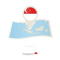 Folded paper map of Singapore with flag pin of Singapore. vector