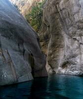 rocky canyon with blue water in Goynuk, Turkey photo