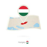 Folded paper map of Hungary with flag pin of Hungary. vector