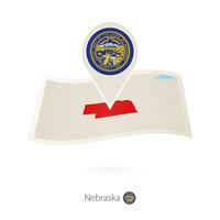 Folded paper map of Nebraska U.S. State with flag pin of Nebraska. vector