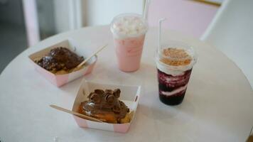 Blueberry Drink and Cinamon Roll Chocolate cake or Dessert on the table photo