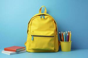 AI generated Backpack with various colorful stationery on blue background photo