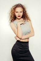 Beauty young woman with curly big and long hair. photo