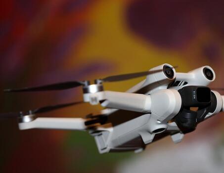 Macro view drone sensor and drone propeller focus is on second propeller droning concept video film making operator rent equipment backgrounds high quality footages photo