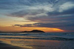 Colorful sunrise on the coast of the South China Sea. photo