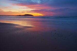 Colorful sunrise on the coast of the South China Sea. photo