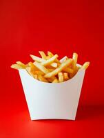 AI generated blank french fries box mockup in plain red isolated background photo