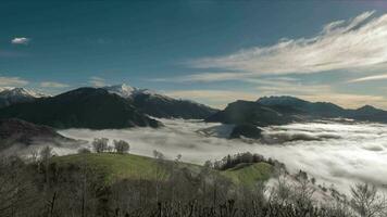 Time-lapse with low fog in mountain valley alpine landscape video