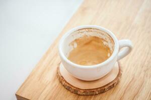 capucino coffee on wood table photo