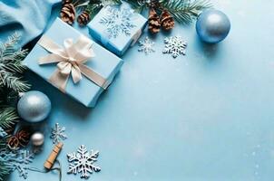 AI generated Christmas background with gifts, fir twigs, cones, snowflakes and baubles on pastel blue texture. Top view, copy space. Winter flatlay. photo