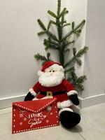 Papa Noel claus Navidad hora abeto rama saludo tarjeta foto