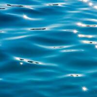 ocean water background abstract background of seawater flow under light exposure photo
