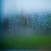 agua gotas en el vaso mojado ventana vaso con salpicaduras y gotas de agua foto