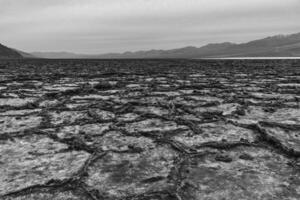 Death valley salt lake on cloudy day photo