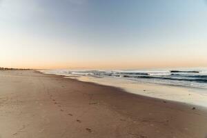 Sunrise on Santa Monica beach photo