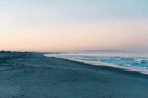 Sunrise on Santa Monica beach photo