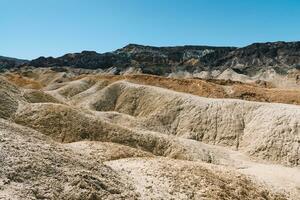 Desert mountains of Nevada with blue sky on the background photo