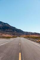 Desert road in Death Valley Park photo